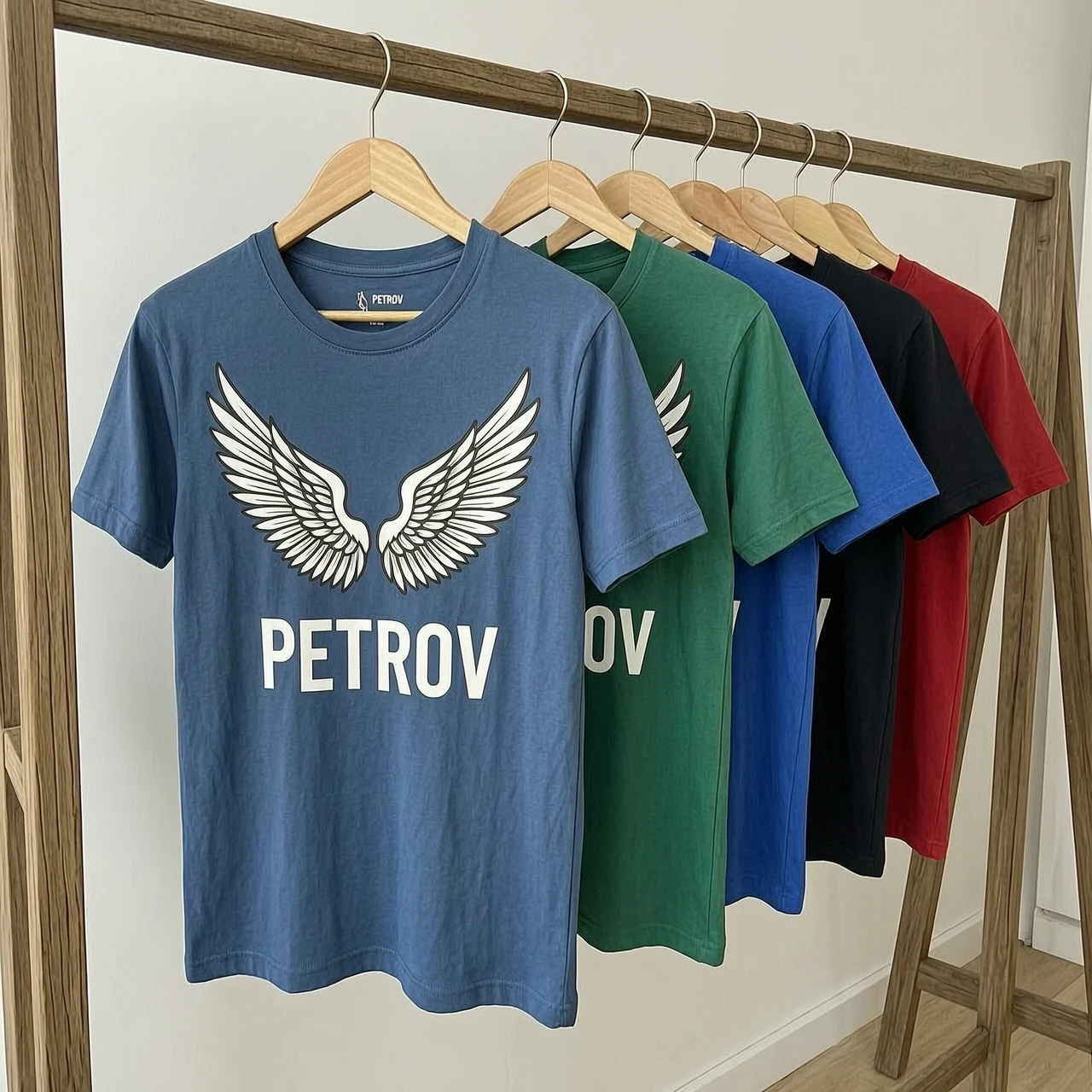 футболки на вешалках с рисунком крыльев и надписью PETROV — работа пользователя Оригинальная Искра